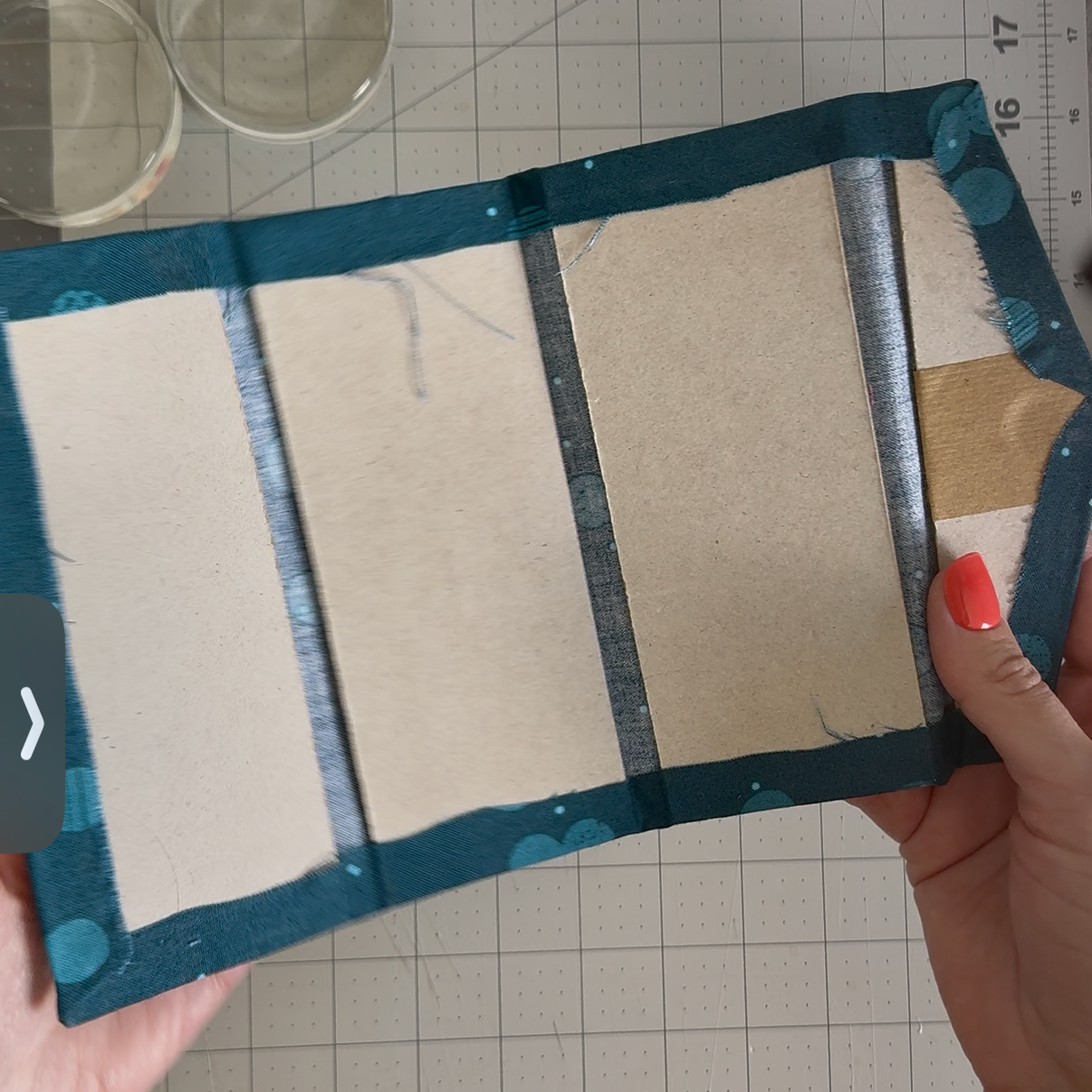 Hinged chipboard panels forming the sunglasses case