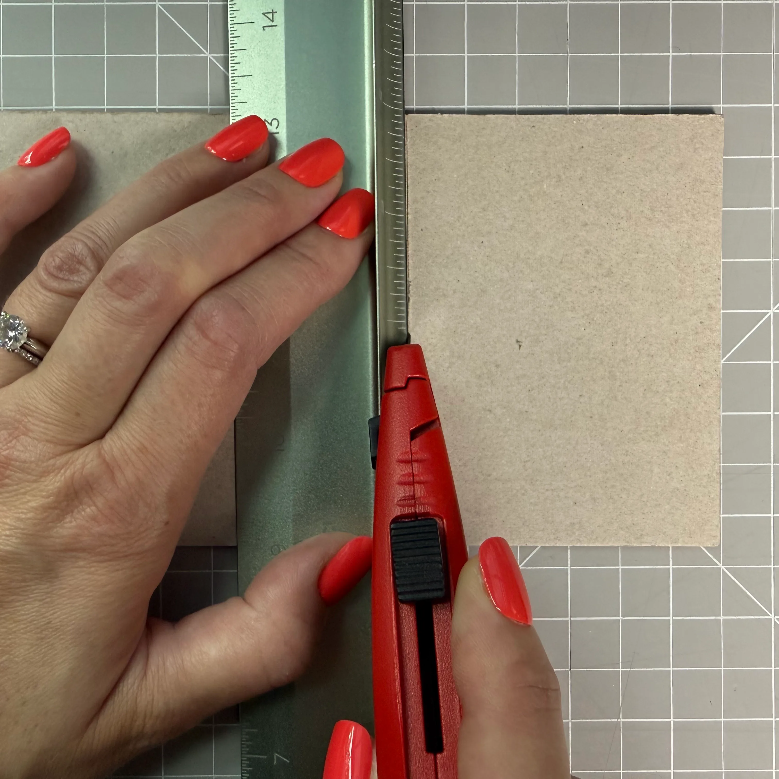 Cutting through chipboard in controlled passes