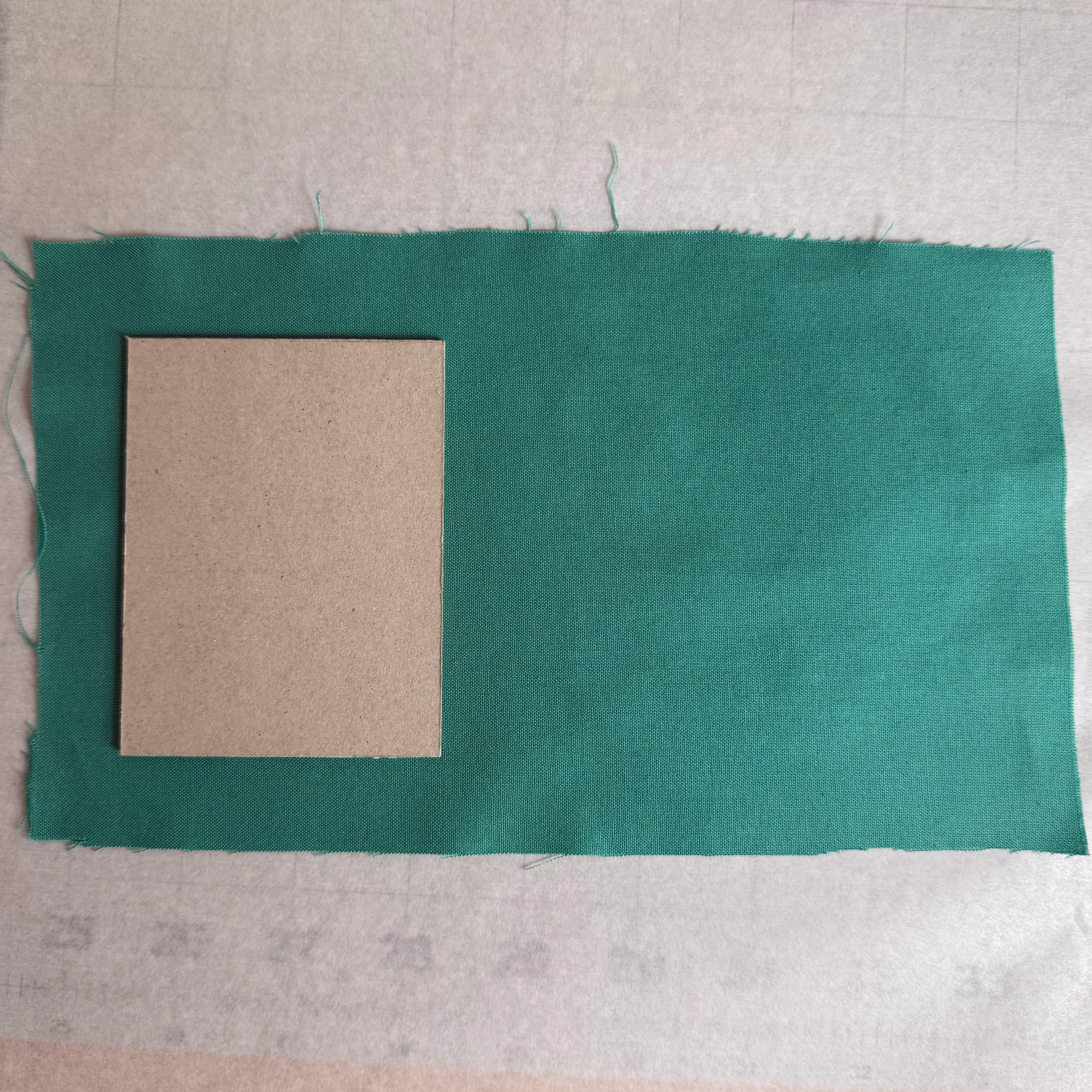 First chipboard piece positioned on the exterior fabric