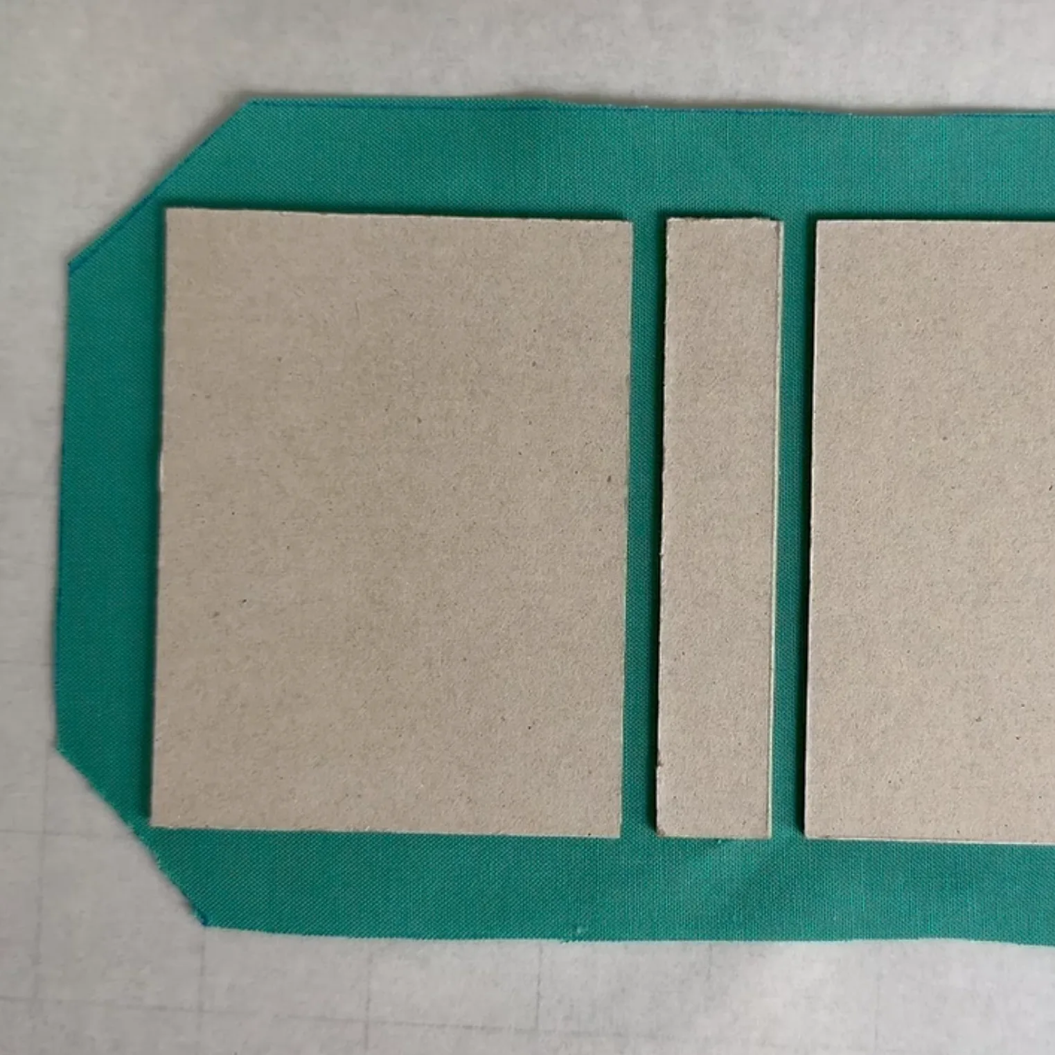 Exterior fabric trimmed and corners clipped for wrapping