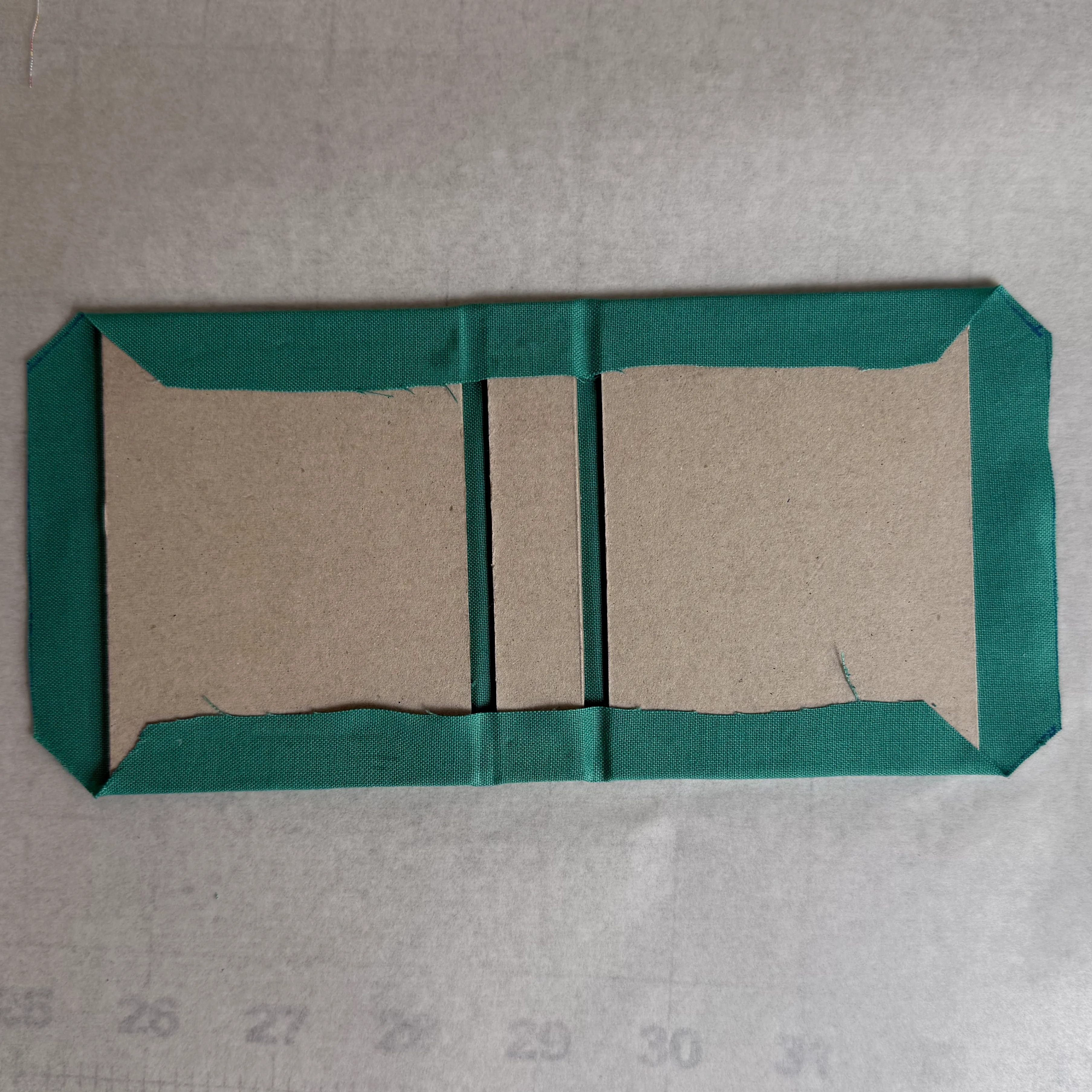 Long exterior edges wrapped across the hinge gaps