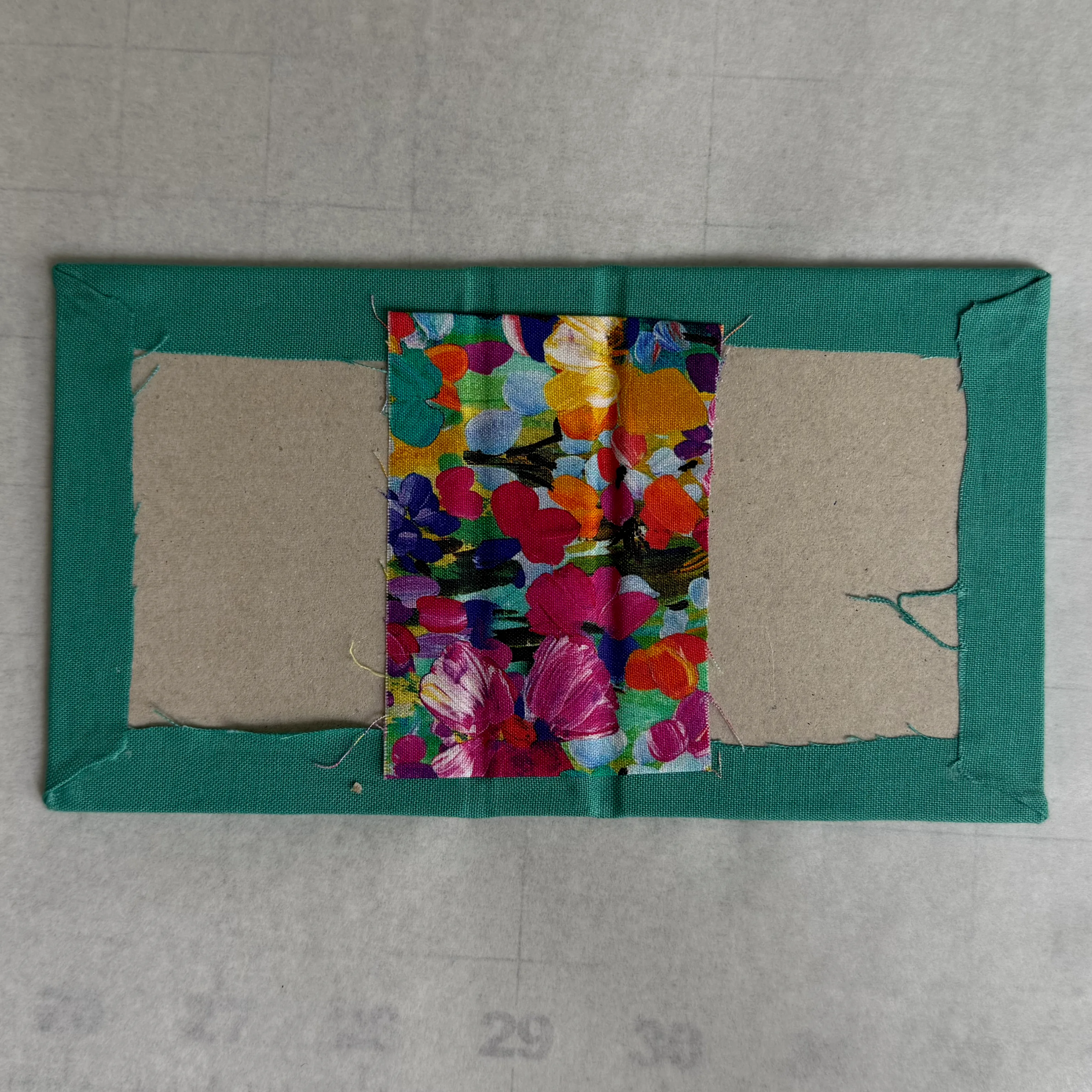Reinforced interior fabric positioned over the hinge assembly