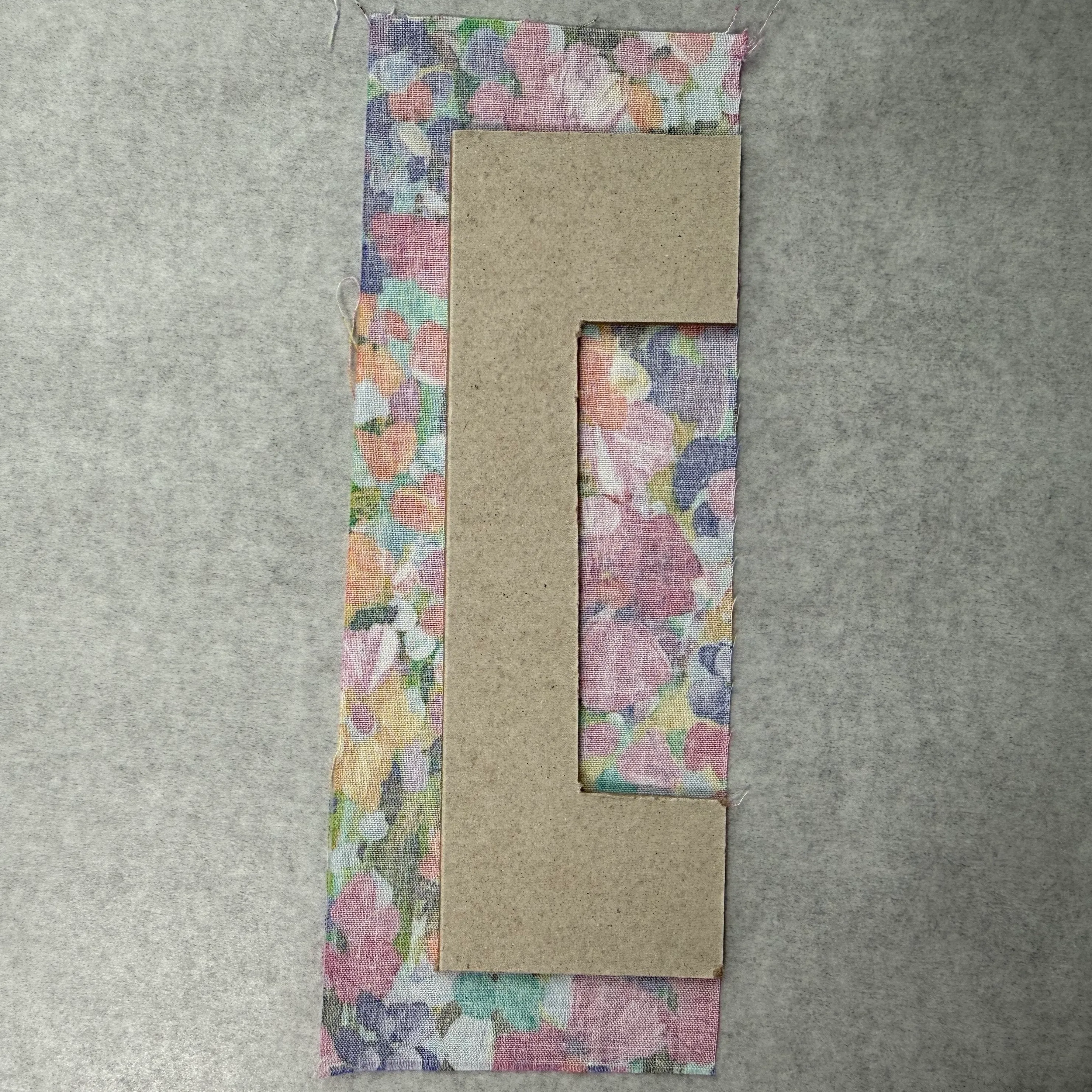 Spreading an even coat of glue over the frame