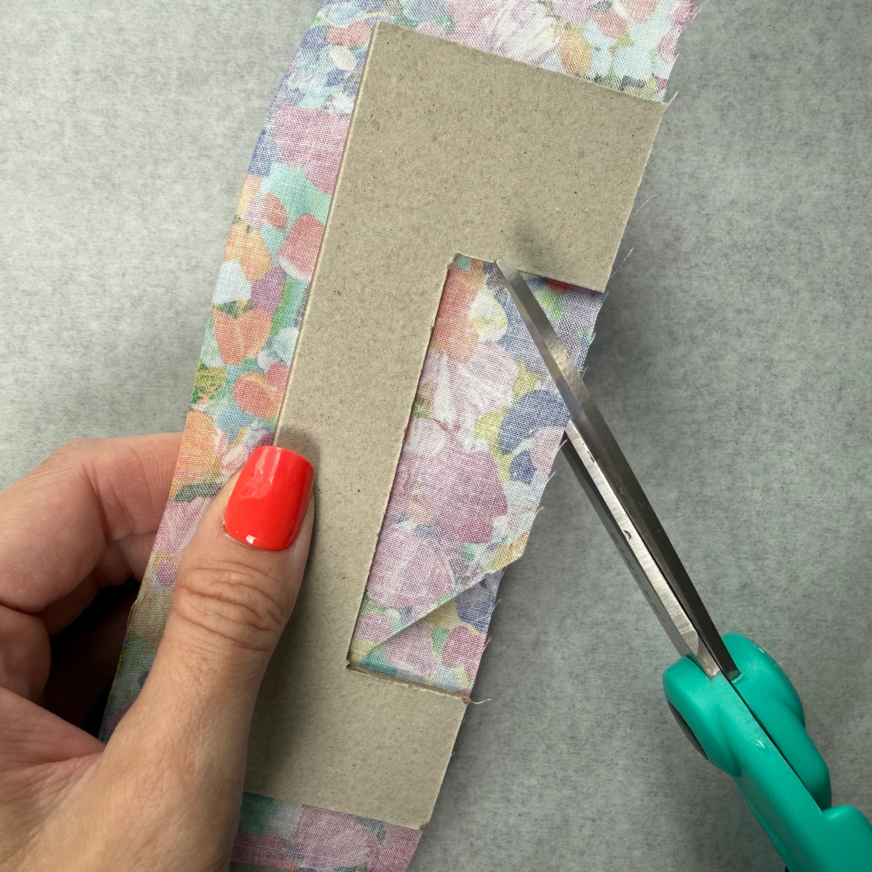 Making the first cut in the fabric center