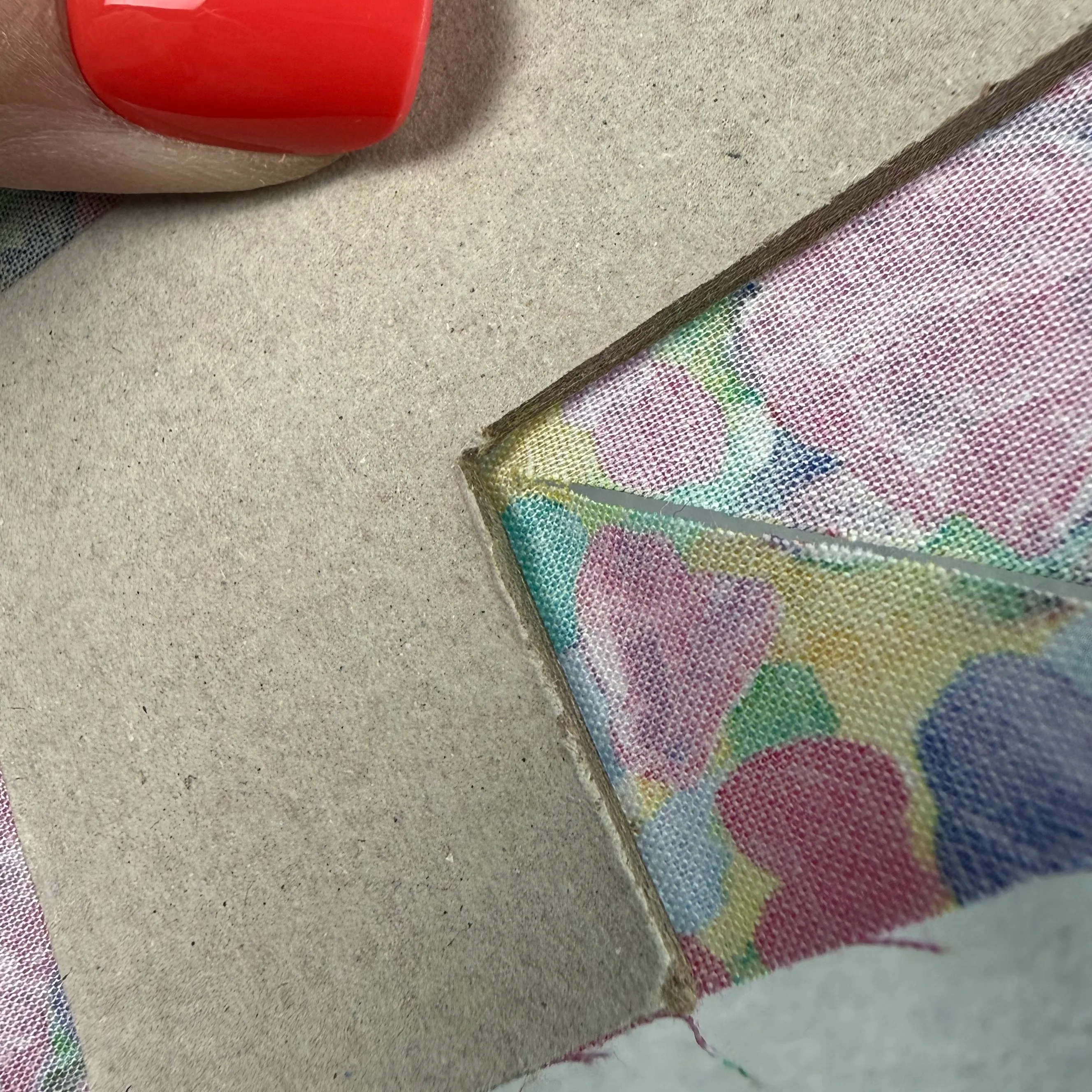 Cutting open the center of the frame fabric
