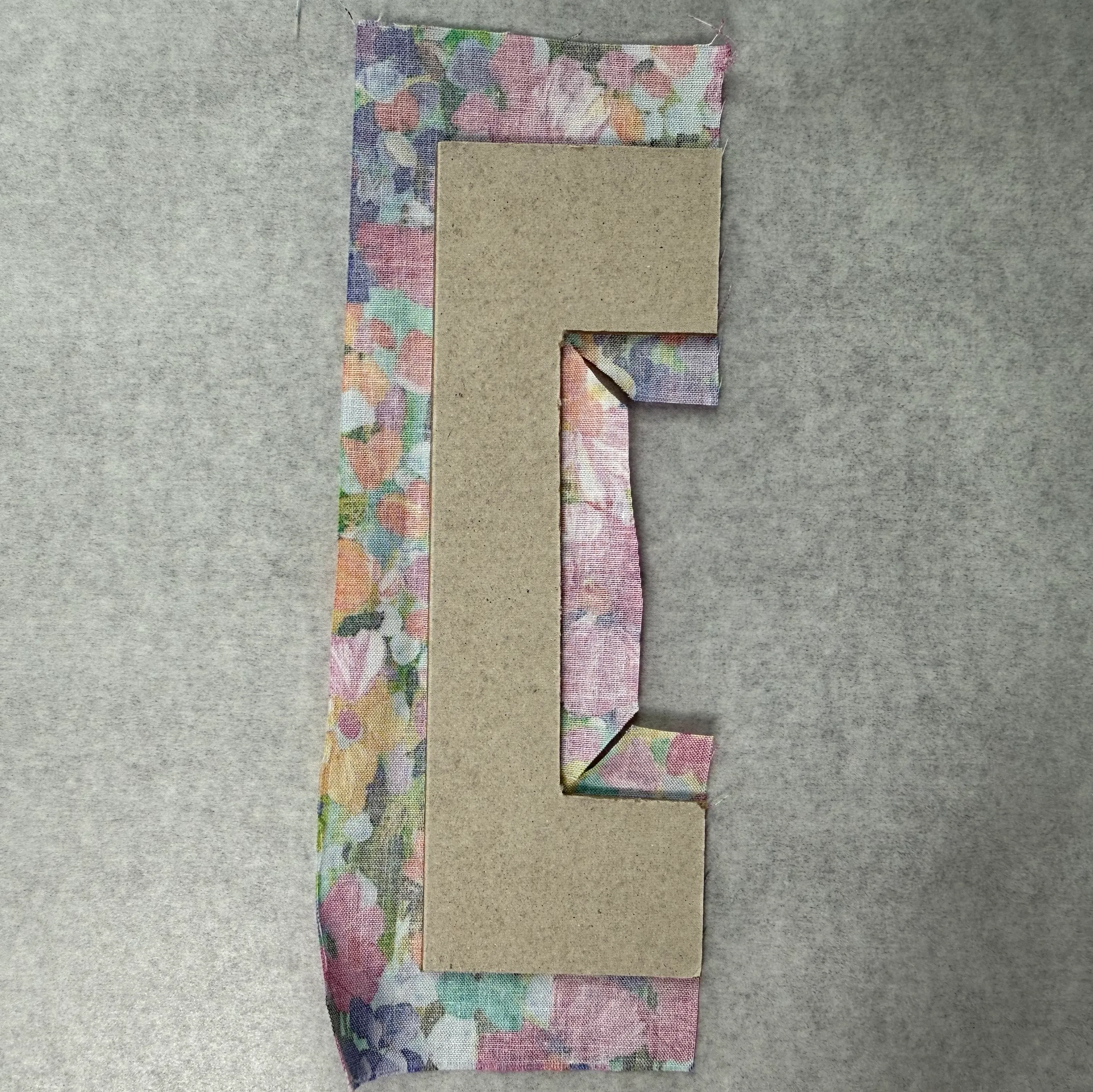 Frame center opened with fabric allowance remaining
