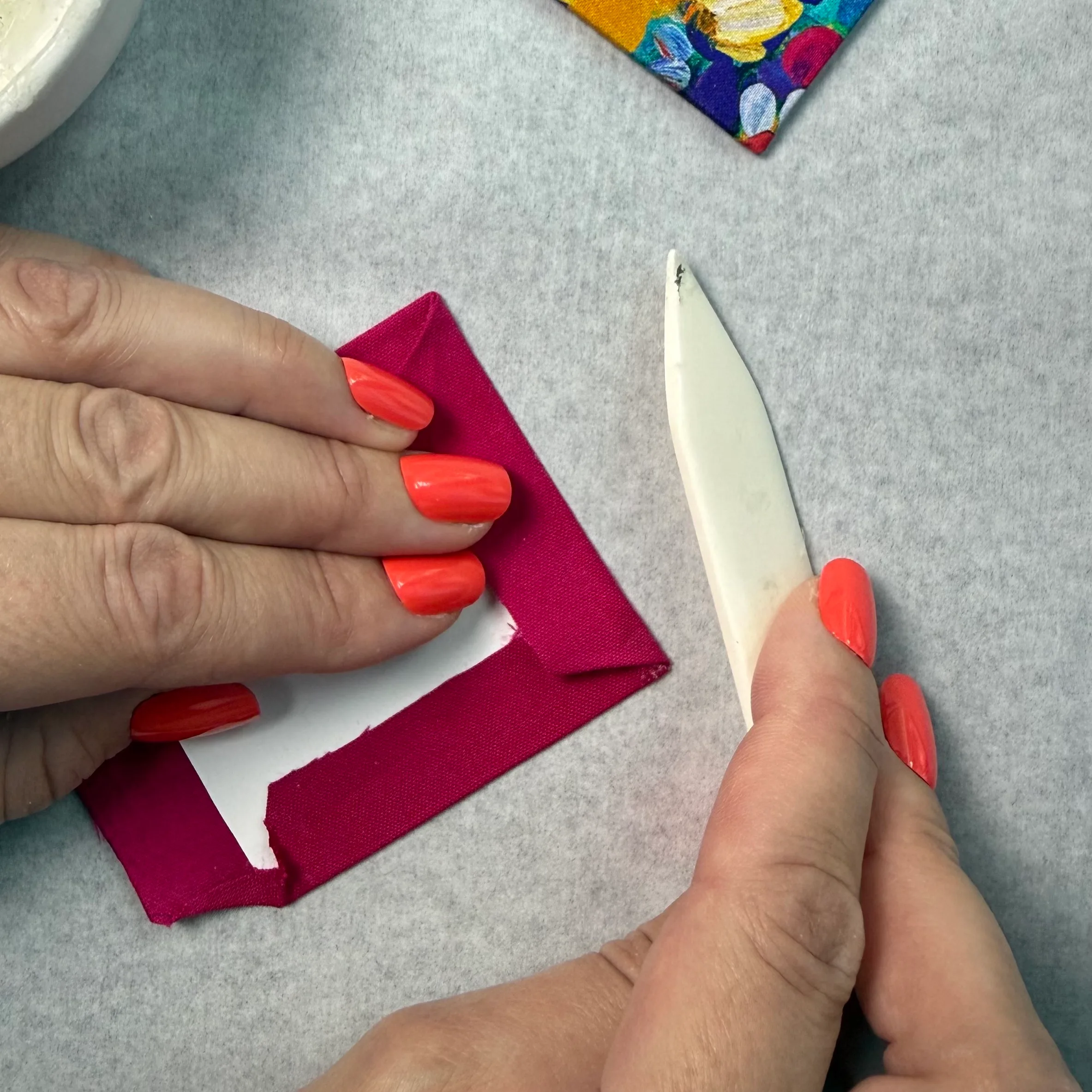 Wrapping fabric around a cardstock panel