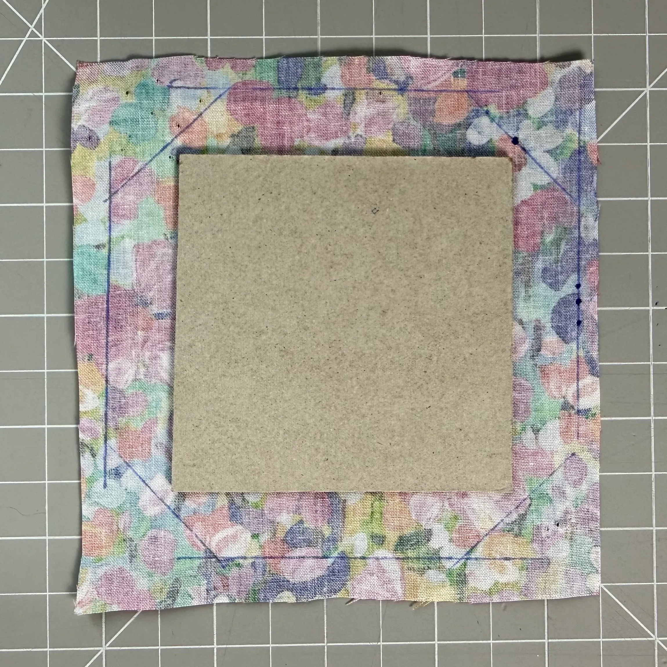 Corner clipping marks drawn on fabric
