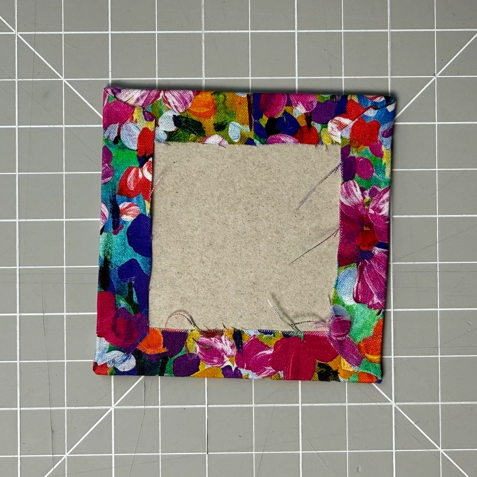 Smoothing a wrapped fabric edge